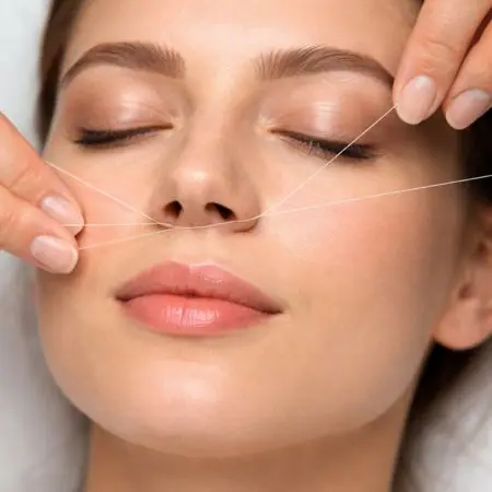 Depilación con hilo labio superior